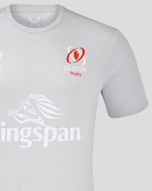 Close up of Ulster Rugby crest on chest with Castore logo on a light grey training tee.