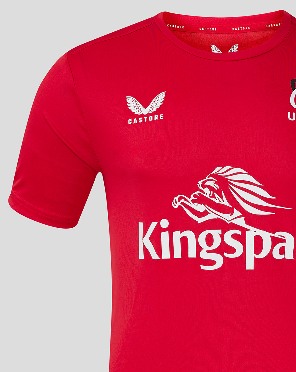 Close up of red ULSter training tee showing Castore logo on left chest and Ulster Rugby crest on right