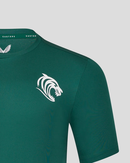Close up of teal training T shirt chest showing a large white tiger crest graphic on the front