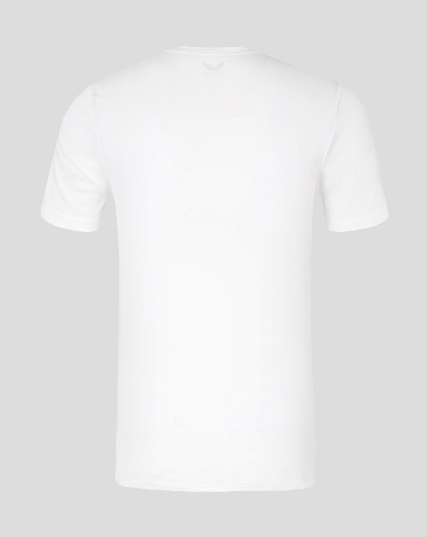 Back view of white men's performance tee with faint Castore logo at the neckline