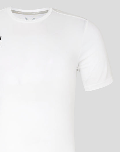 Close up of white performance tee neckline with gray Castore branded inner collar tape