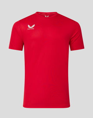 Red performance tee with a white Castore crest on the left chest