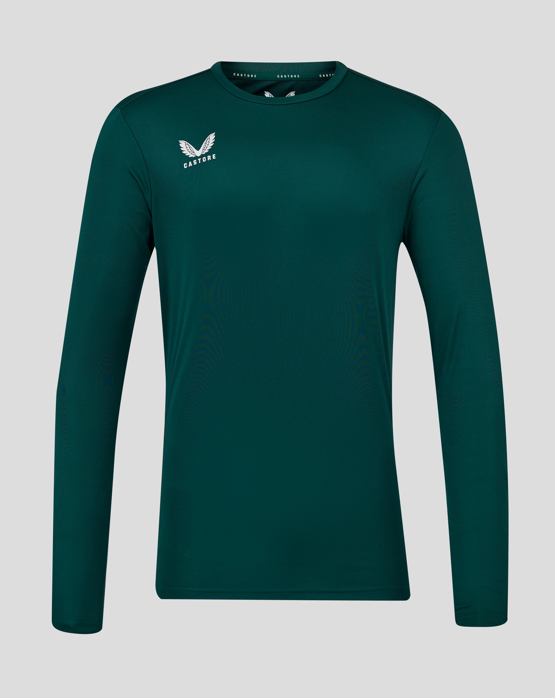 Botanical Garden teal long sleeve tee close up of chest showing white wing logo and Castore branding at the collar