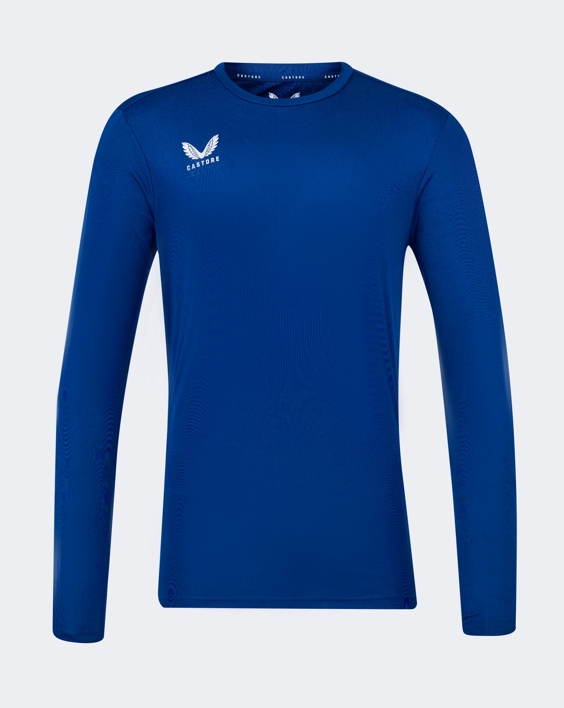 Blue long sleeve performance tee with crew neck forward shoulder seam and Castore logo