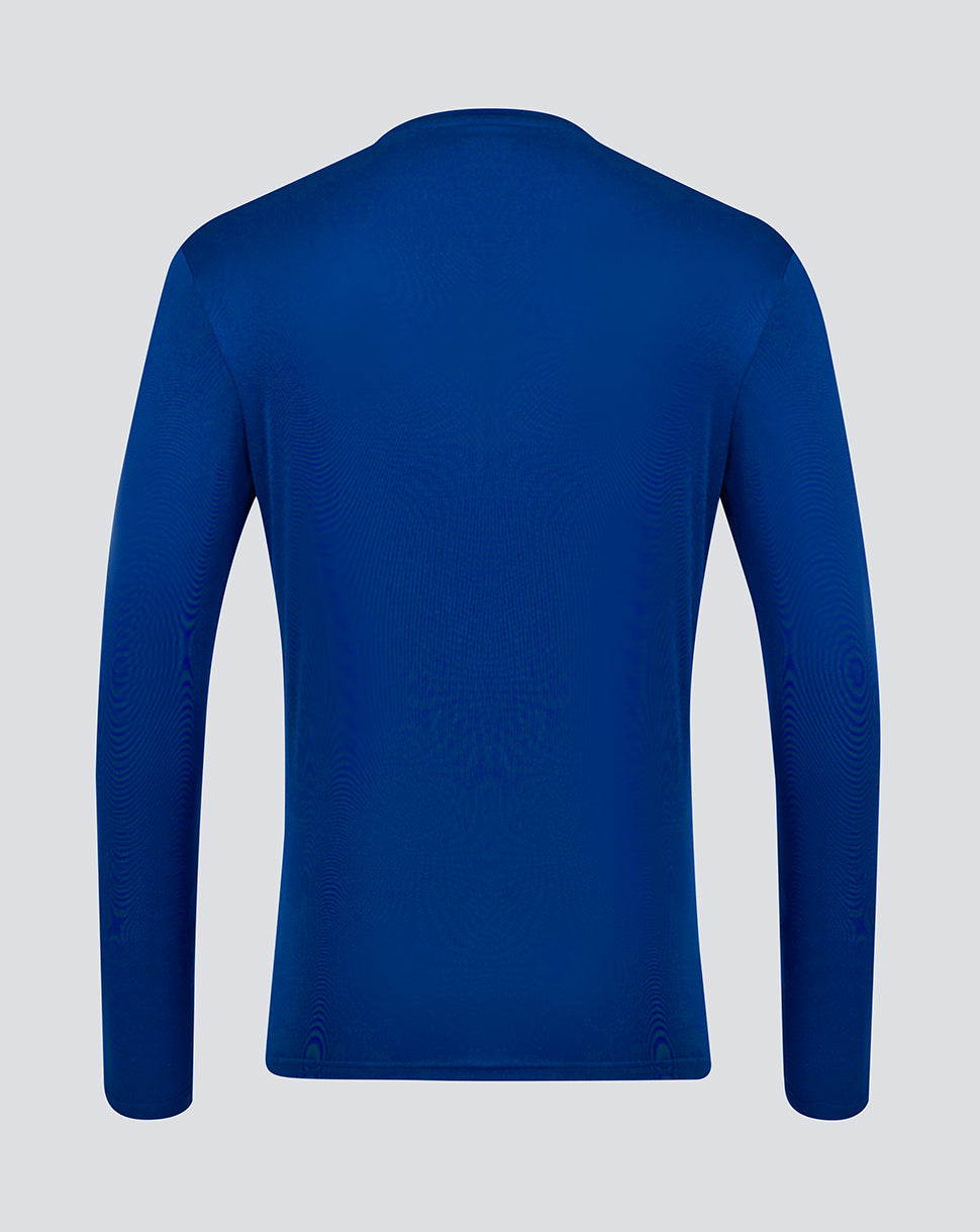 Rear view of blue long sleeve performance tee from Surf The Web collection on a light background