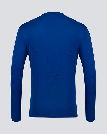 Rear view of blue long sleeve performance tee from Surf The Web collection on a light background