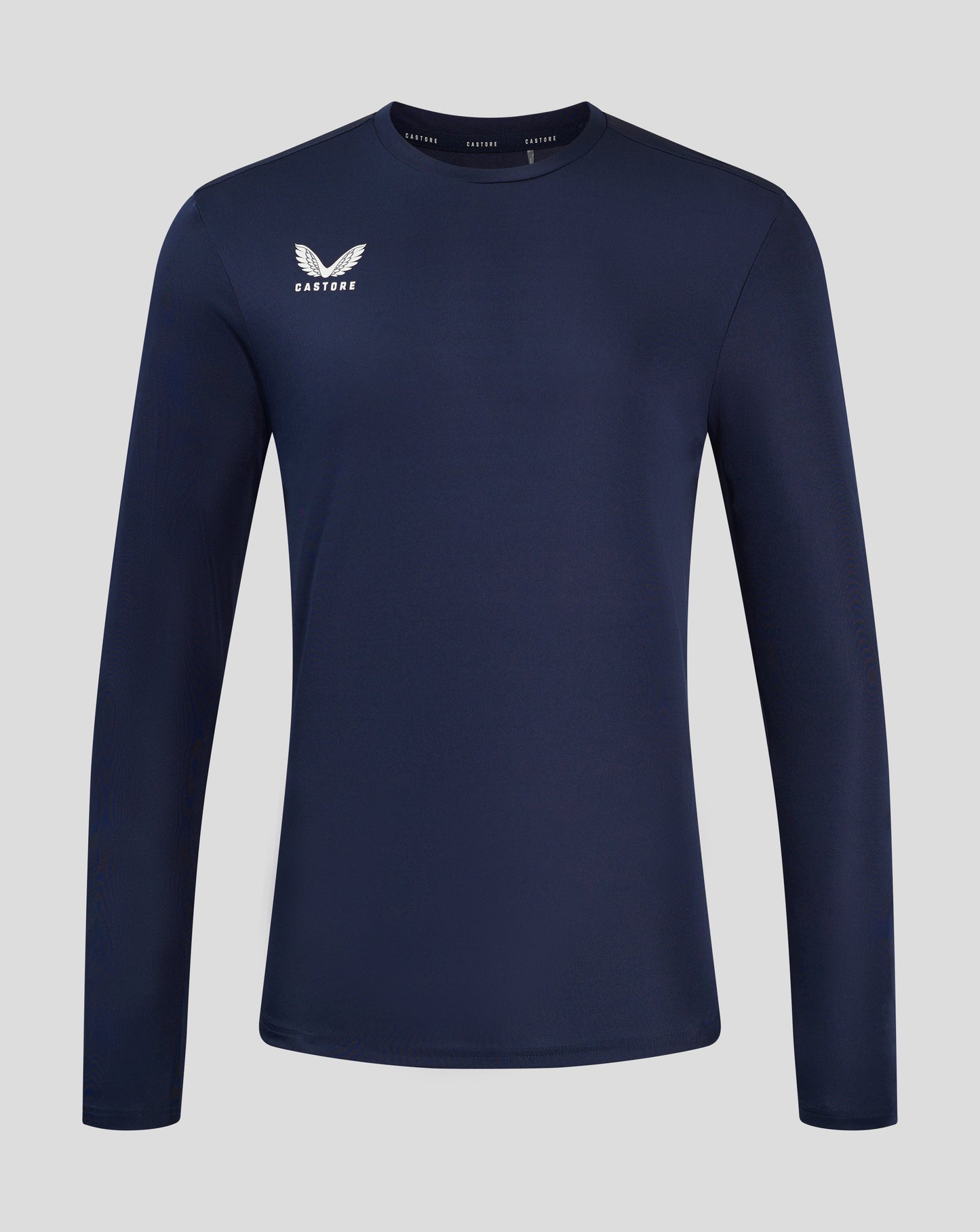 Navy blue long sleeve performance tee with crew neck and white Castore logo on the chest.