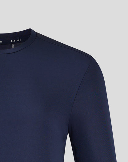 Front view of navy Peacoat long sleeve tee displaying Castore crest and logo centered on the chest