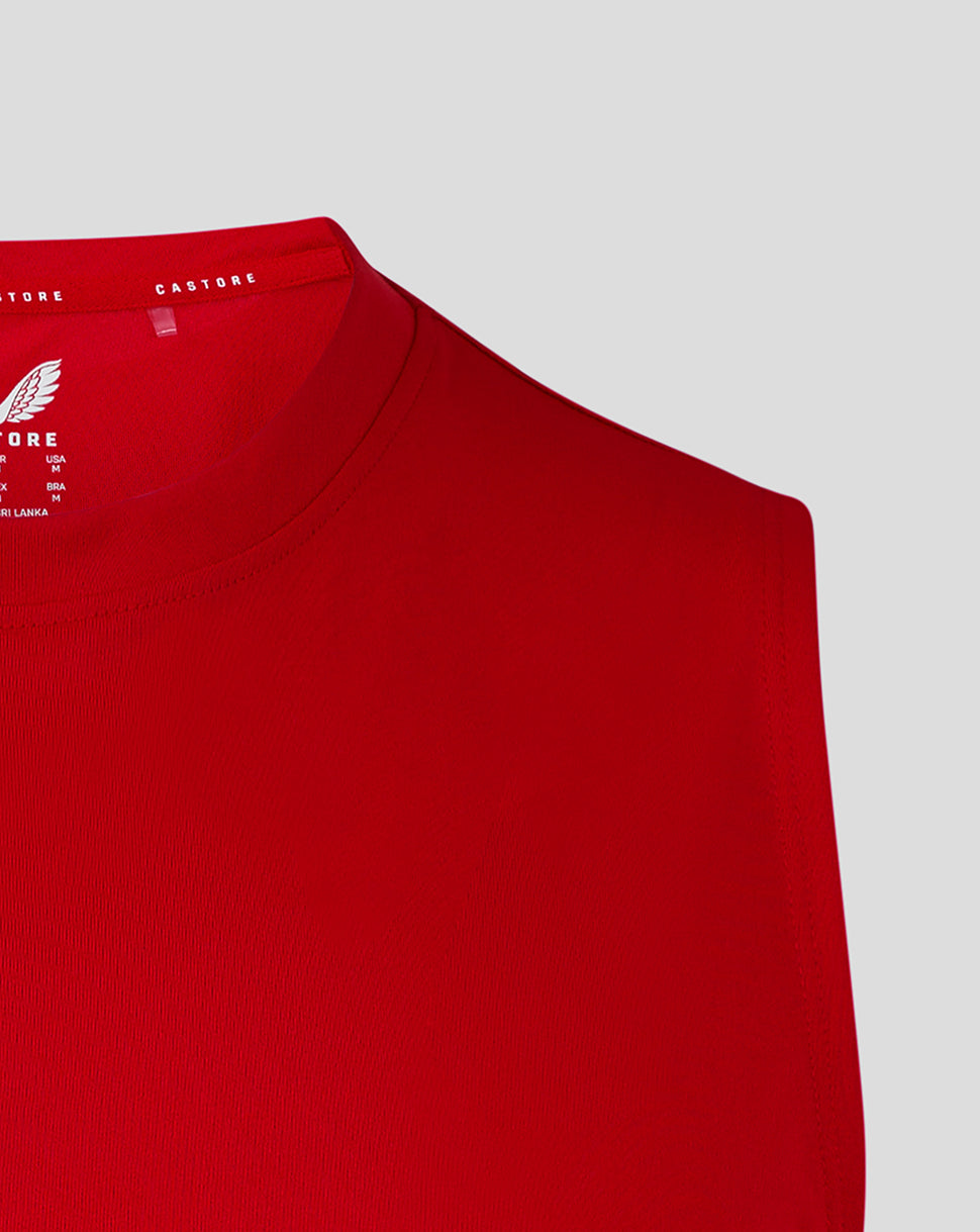 Close up of red sleeveless singlet neck area with interior tag and partial Castore branding