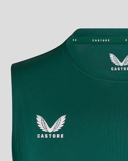 Close-up of chest area with white wing crest and Castore branding on botanical green vest