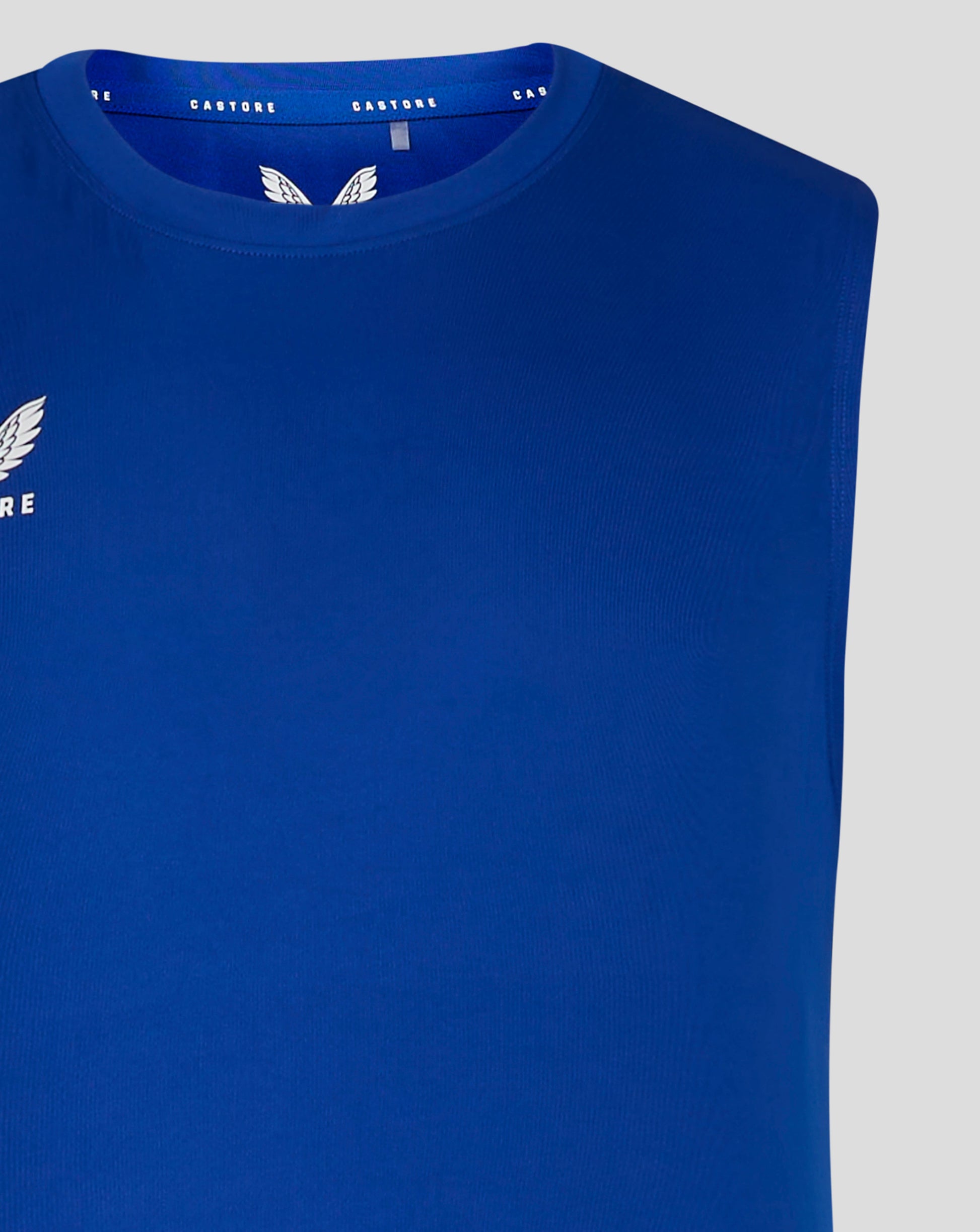 Close up of blue training singlet neck with heat sealed Castore branding along the collar