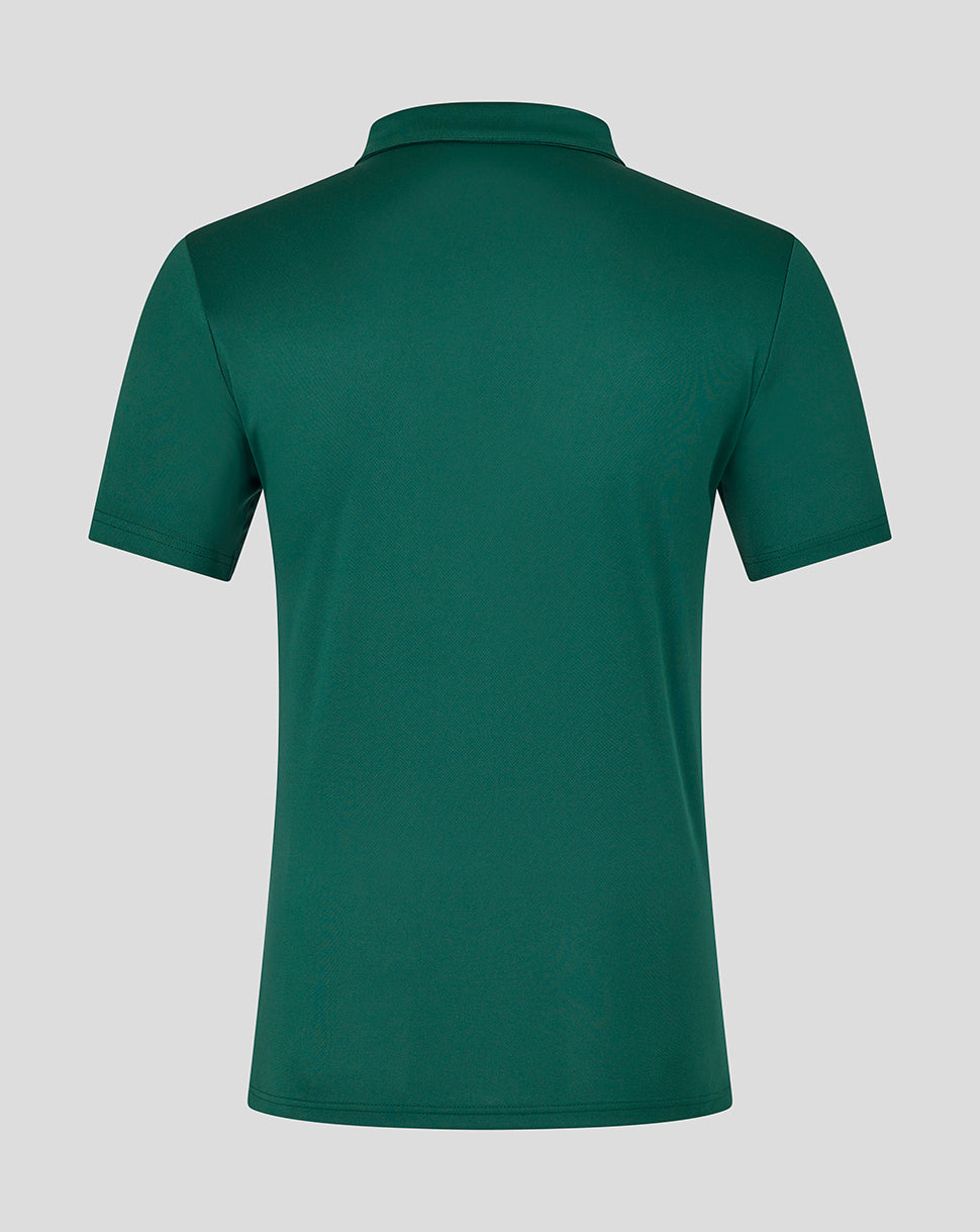 Back view of green botanical Leicester Tigers polo shirt with short sleeves on a neutral background