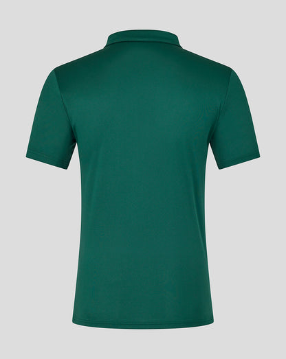 Back view of green botanical Leicester Tigers polo shirt with short sleeves on a neutral background