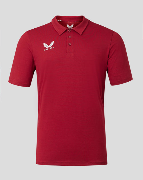 Red cotton leisure polo with self fabric collar three button placket and white Castore logo on left chest.