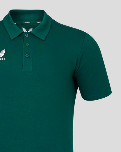 Forest green polo shirt with self fabric collar and three button placket and Castore logo on chest
