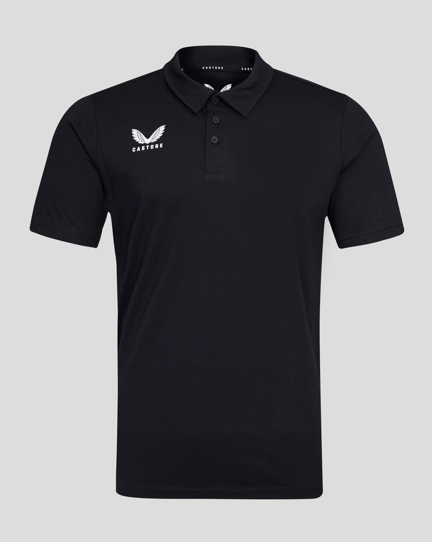 Front view of black Castore polo shirt with white wing logo on the left chest and a three button placket