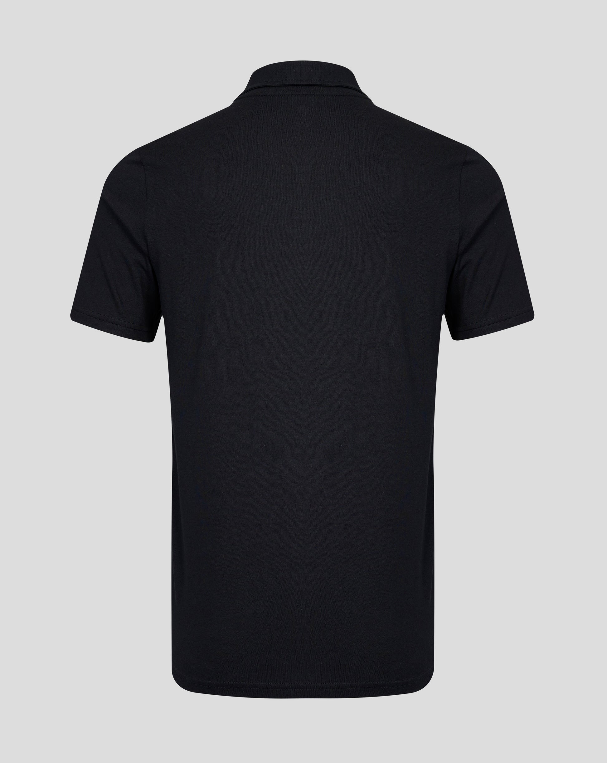 Rear view of a black polo shirt with a simple collar and short sleeves against a light gray background