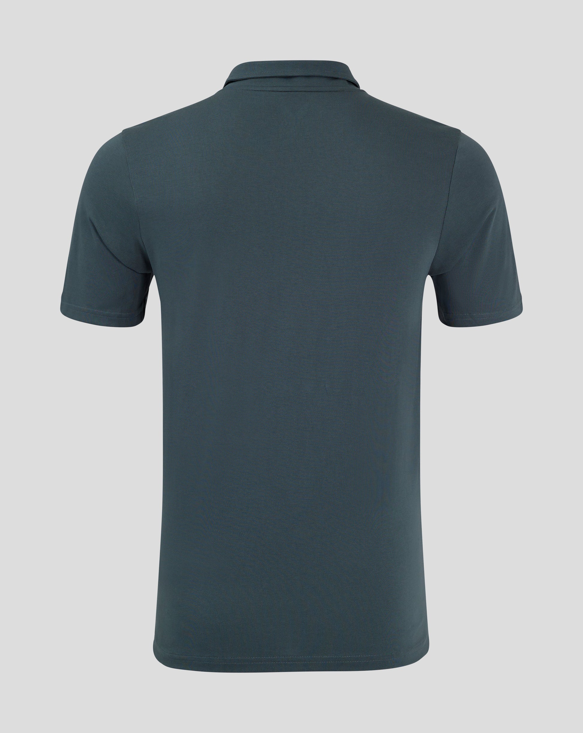 Back view of dark slate polo showing clean silhouette and heat sealed Castore logo at the neck
