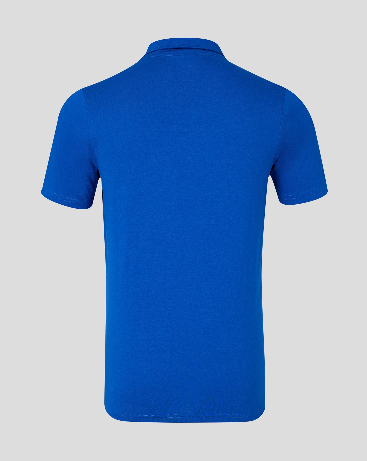 Back view of blue polo shirt with collar and shoulder seam