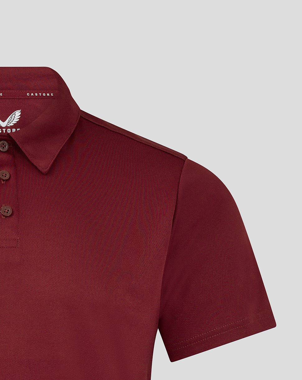 Polo shirt collar and shoulder close-up with three button placket and Castore branding