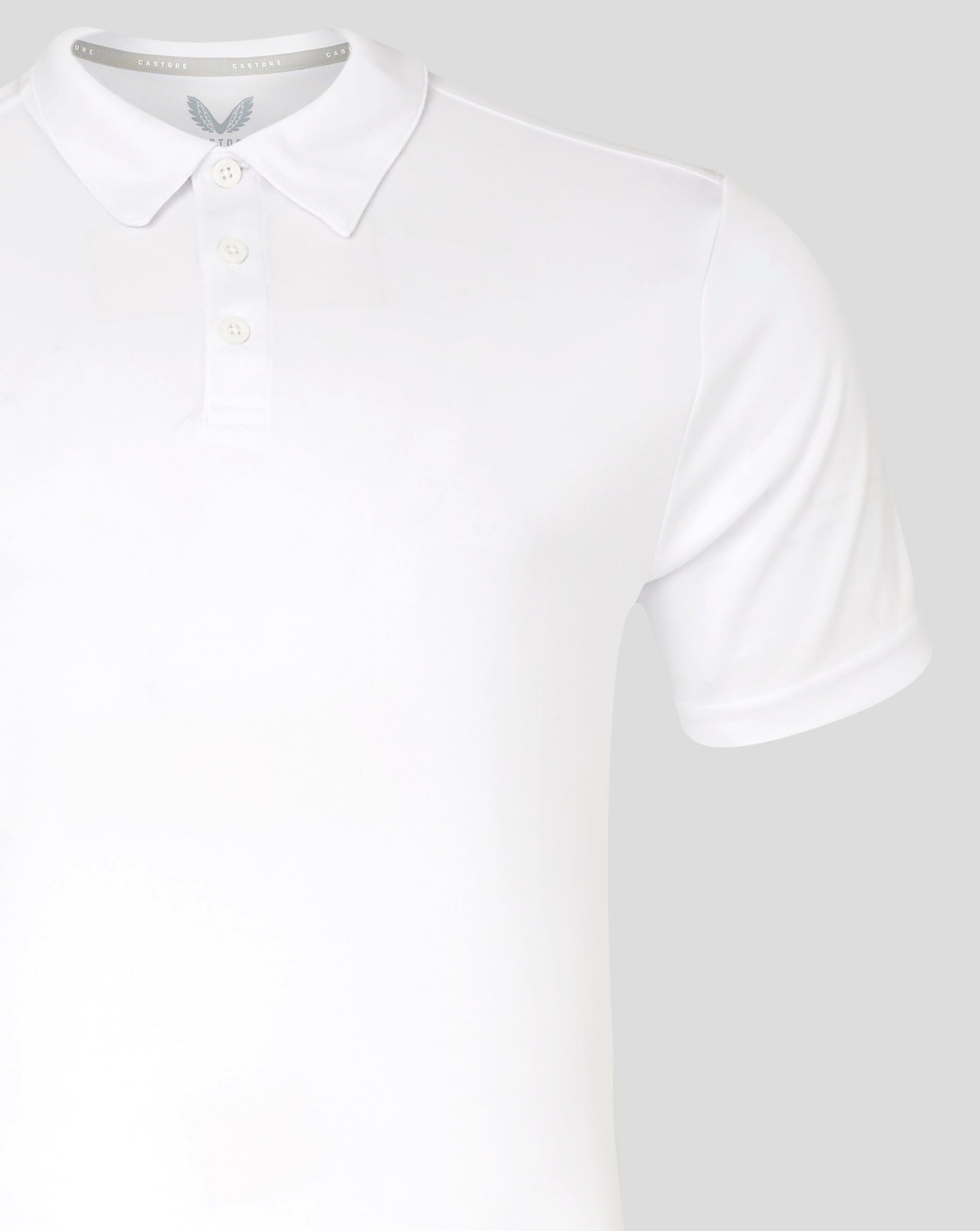 Black polo shirt with Castore logo on left chest and branding on the inside collar