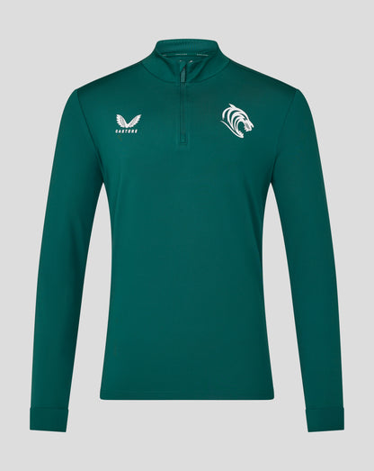 Front view of teal botanical Leicester Tigers training midlayer with Castore logo on left chest and tiger crest on right