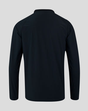 Back view of navy rugby top with minimal seams and smooth fabric
