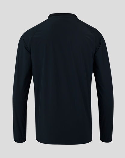 Back view of navy rugby top with minimal seams and smooth fabric