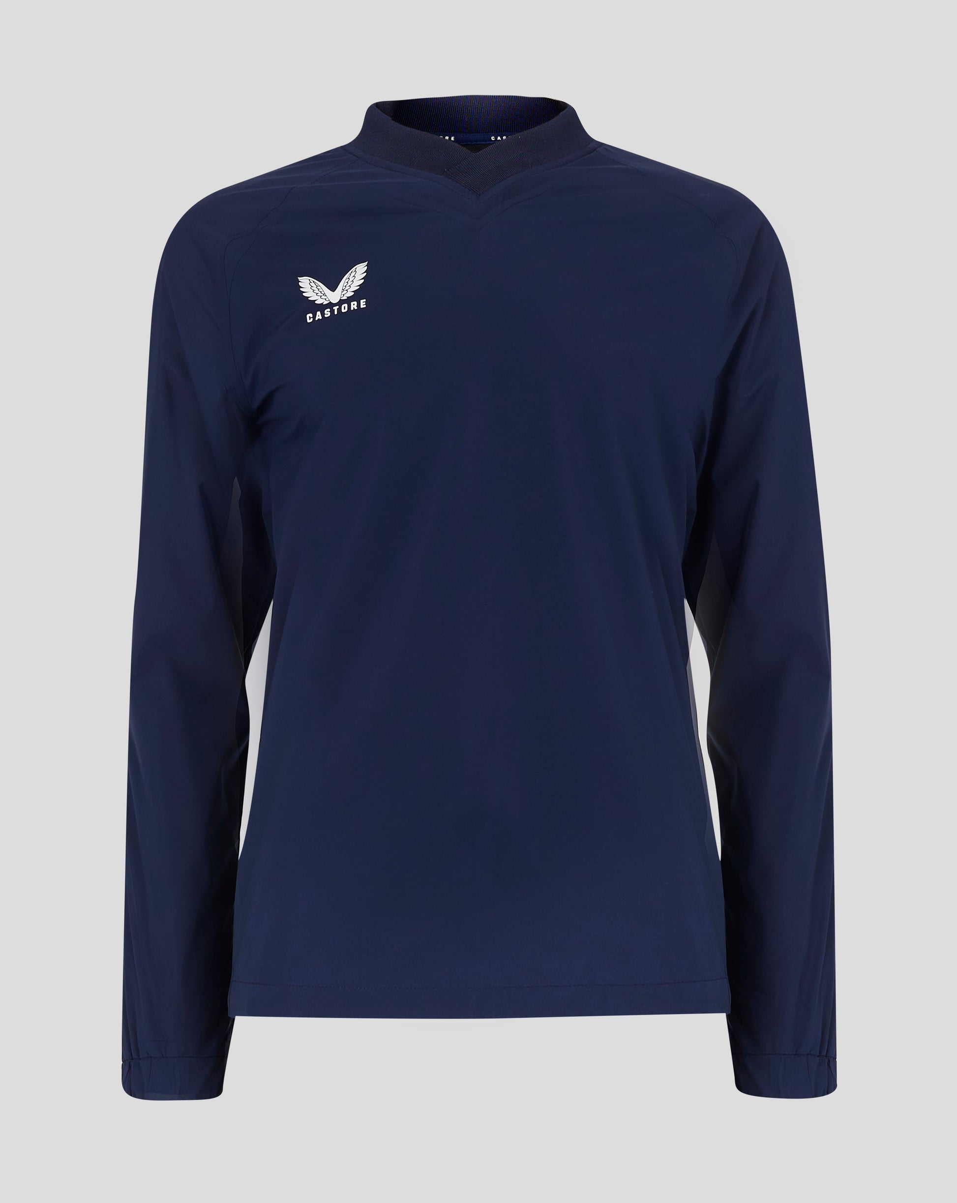 Front view of navy rugby top with white Castore wing logo on left chest and ribbed V neck