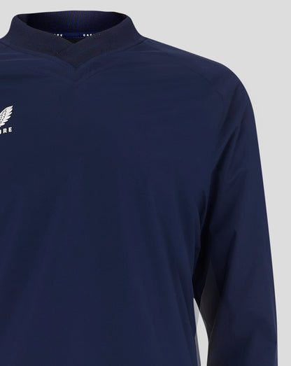 Navy Mens Rugby Top close up showing ribbed V neck collar and Castore wing logo on chest