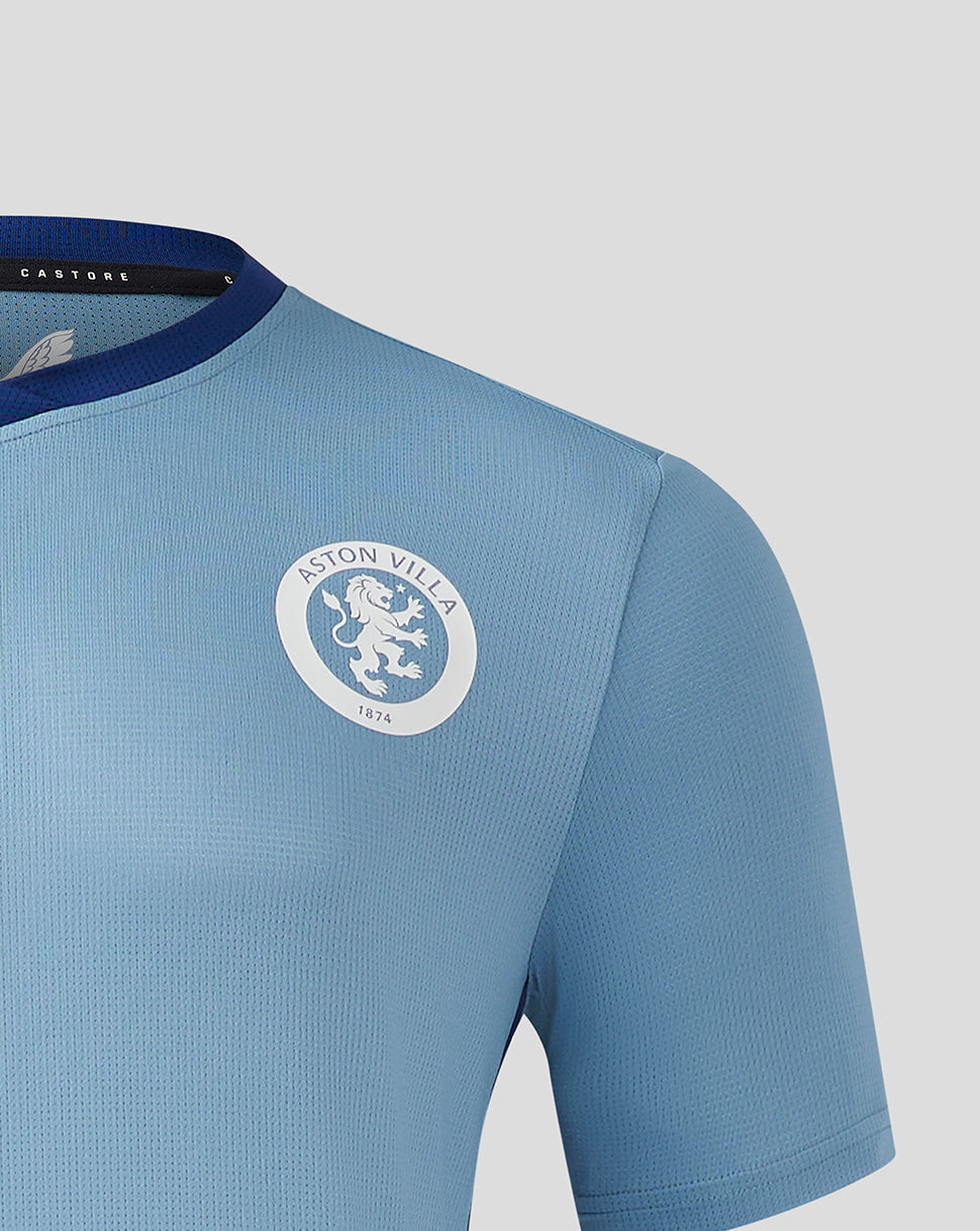Front upper chest of light blue jersey with Aston Villa crest on the left and navy neckline trim