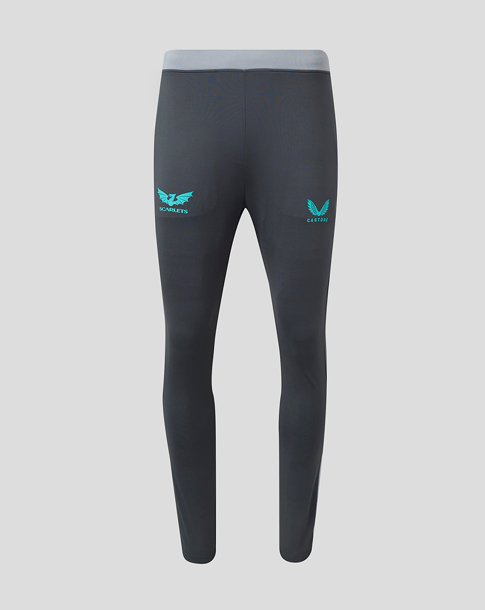 Back view of dark grey Scarlets training pants with a light grey waistband and teal Scarlets club crest on the left leg and Castore branding on the right leg.