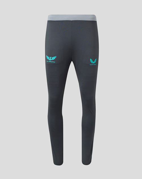 Back view of dark grey Scarlets training pants with a light grey waistband and teal Scarlets club crest on the left leg and Castore branding on the right leg.