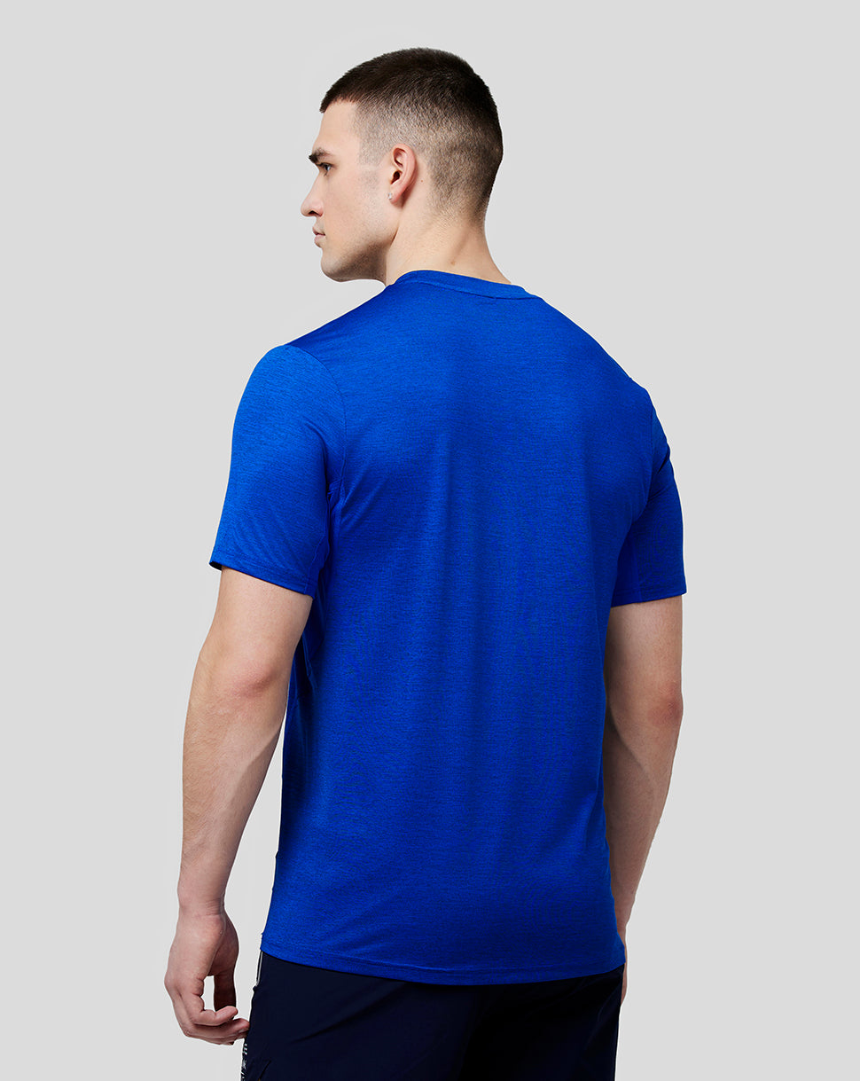 Back view of a male model wearing blue Oracle Red Bull Racing tee