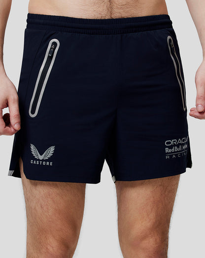Men's navy active running shorts with zipped side pockets and Oracle Red Bull Racing Castore branding.