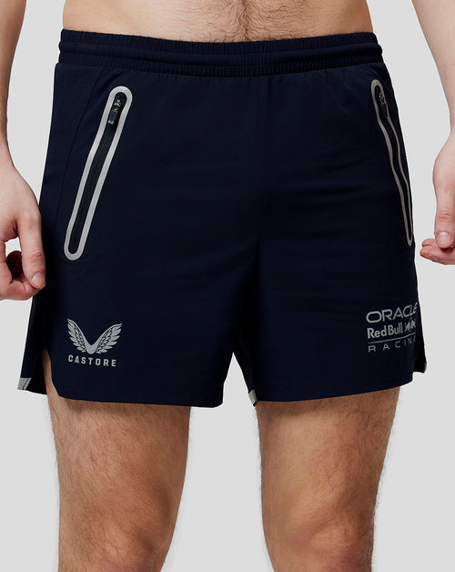 Men's navy active running shorts with zipped side pockets and Oracle Red Bull Racing Castore branding.