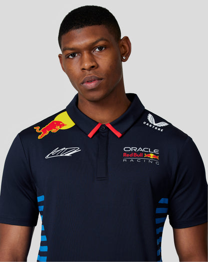 Male model wearing night sky Oracle Red Bull Racing polo with Red Bull and Oracle logos and Verstappen signature