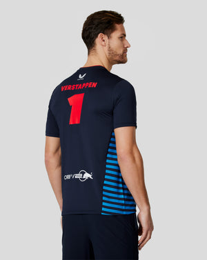 Back view of a man in a dark Red Bull Racing T shirt with Verstappen name and large red 1 on the back