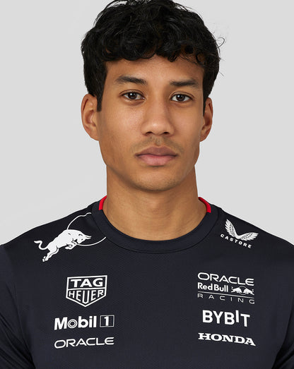 Close up of a man wearing the navy Race Team T Shirt showing sponsor logos on the chest including Oracle Red Bull Racing BYBIT and Honda