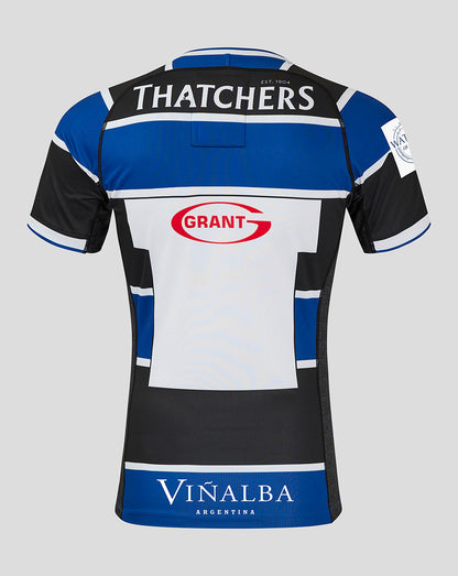 Back view of Bath Rugby Home Pro Shirt with Thatchers across the upper back, Grant logo at mid back, and Viñalba Argentina on the hem.