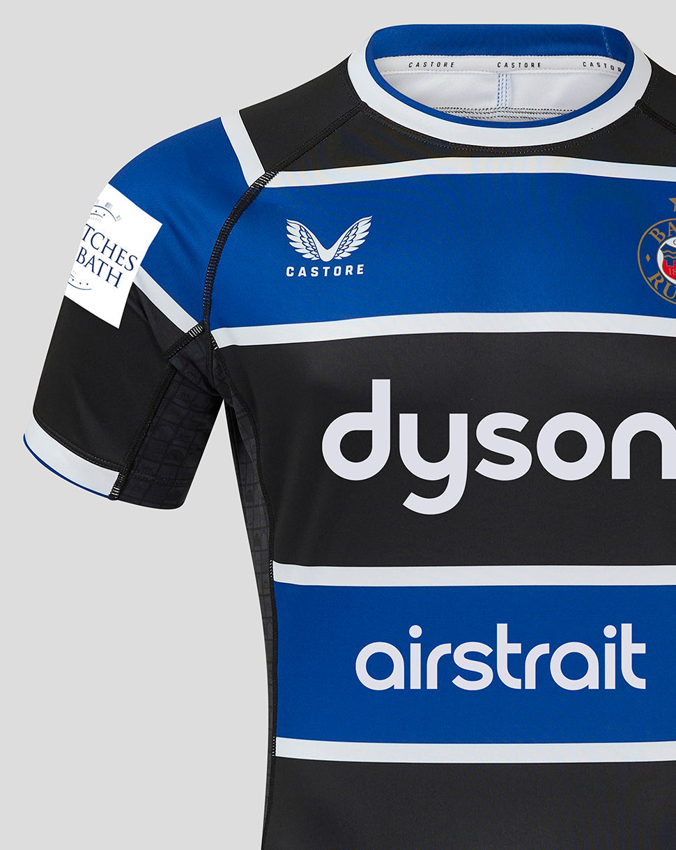 Front close-up of Bath Rugby Home Shirt with Castore logo on left chest, Bath Rugby crest on right, and dyson and airstrait across the chest.