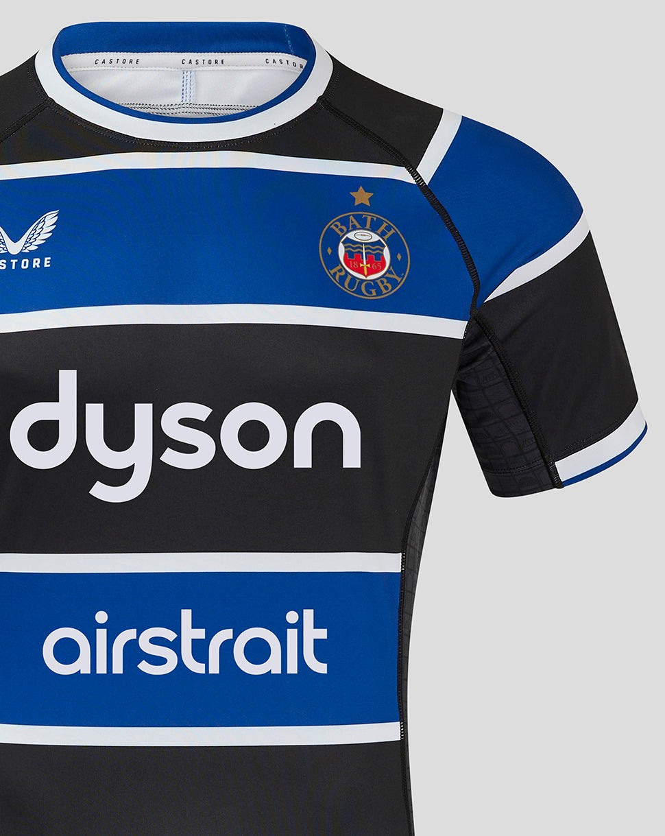 Close up of Bath Rugby Home Pro Shirt showing blue chest stripe, Bath Rugby crest and Dyson sponsor with airstrait branding.