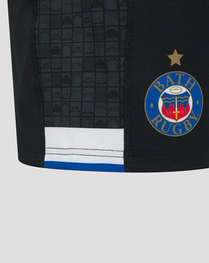 Close up of Bath Rugby Home Pro Shorts showing grid side panel and crest on the thigh with blue white hem details