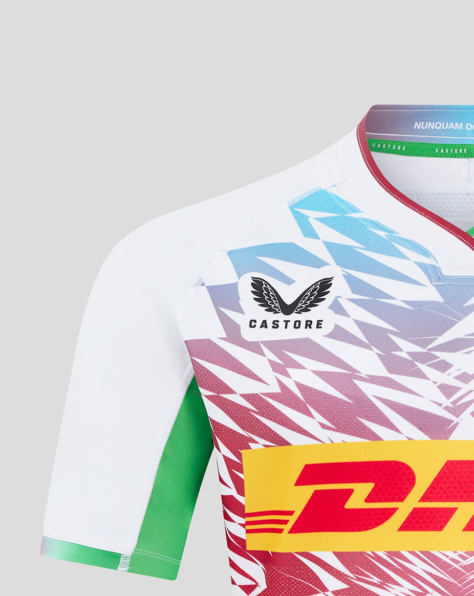 Harlequins Away Pro Shirt shoulder close up showing multicolor geometric print and Castore branding on chest