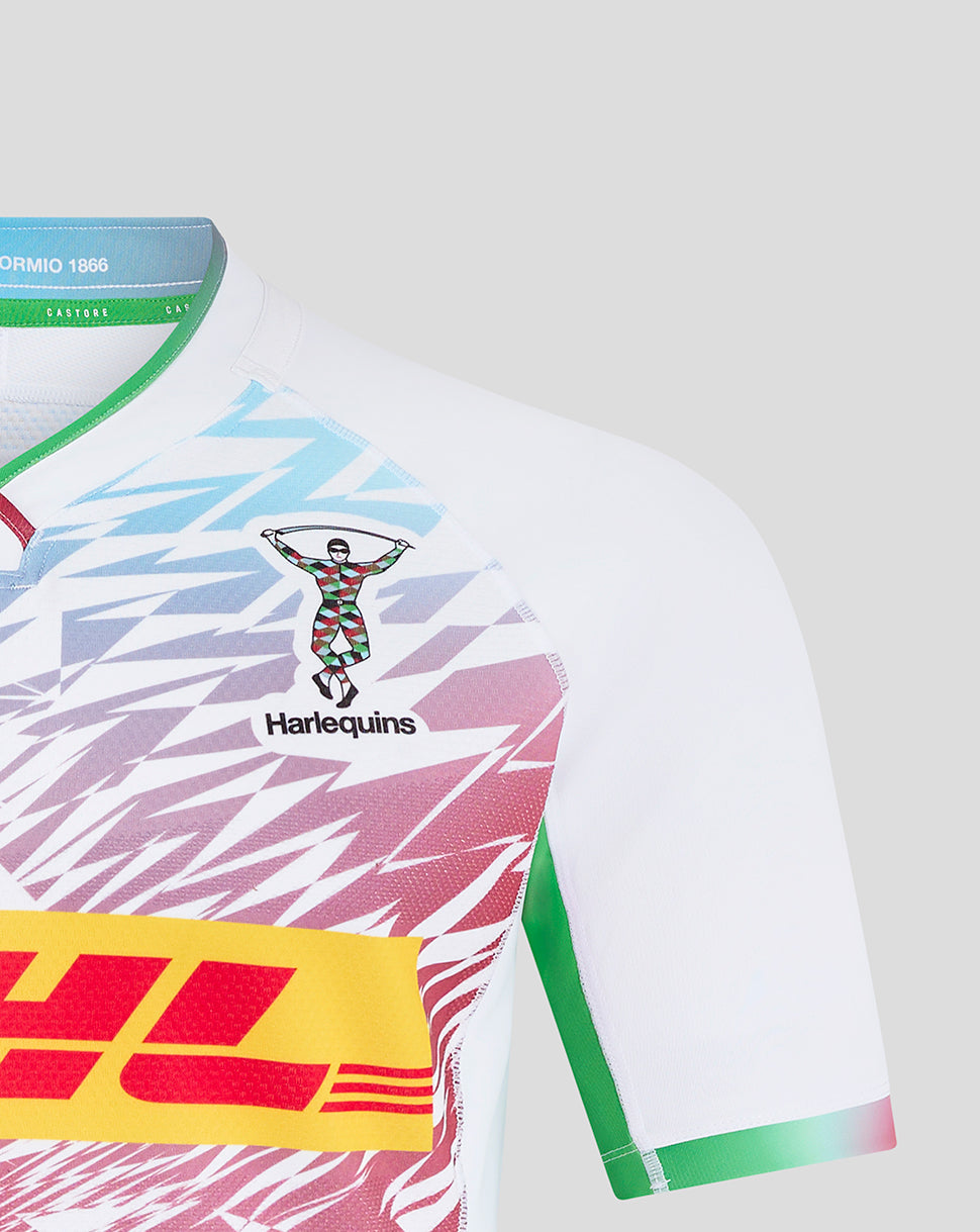 Close up of Harlequins Away Pro shirt showing crest on left chest and multicoloured front pattern.