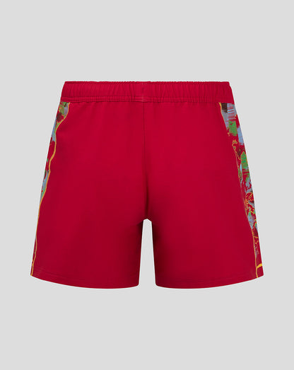Back view of red Harlequins shorts with world map side panel and visible team logos