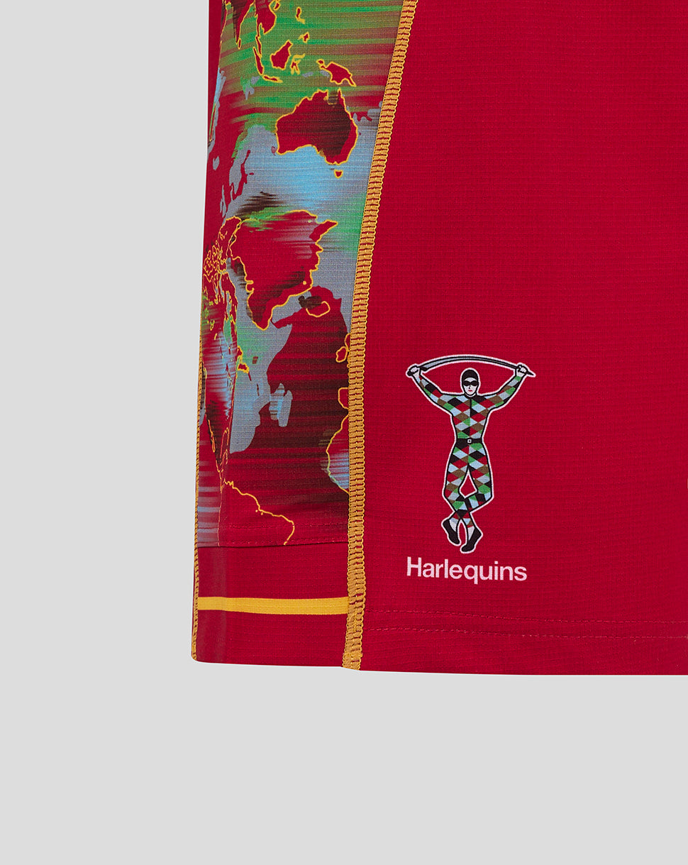 Left side view of red Harlequins shorts showing world map side panel and Harlequins crest