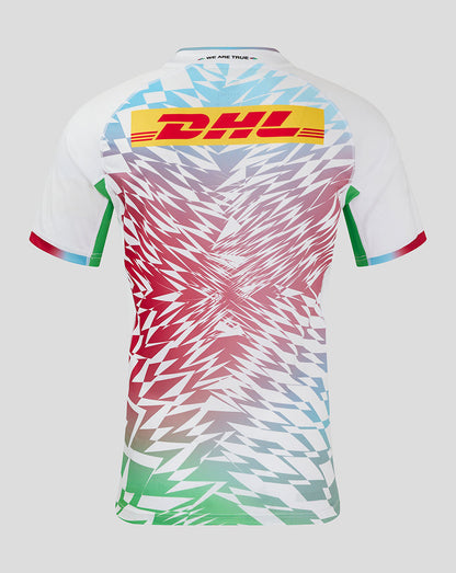 Back view of Harlequins away shirt featuring a multicolor geometric gradient and a large DHL logo across the back.