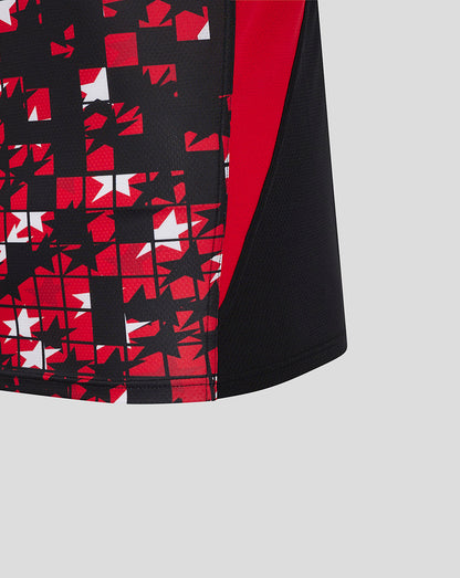 Torso area of Saracens tee with bold red white geometric pattern on black fabric and red side panel