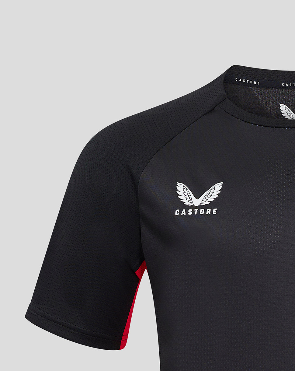 Castore logo and wing emblem on left chest of dark Saracens jersey